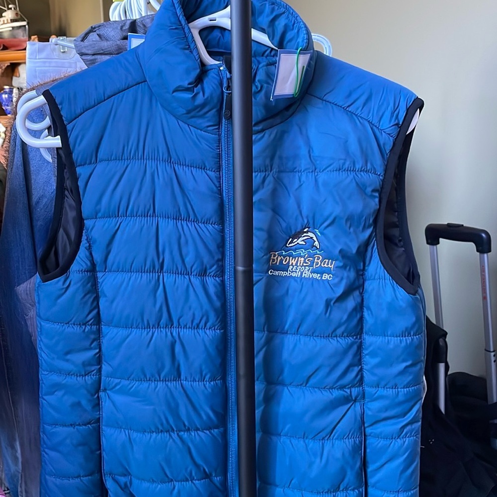 Small ladies puffer vest teal aqua color 
Browns Bay marina Campbell River logo